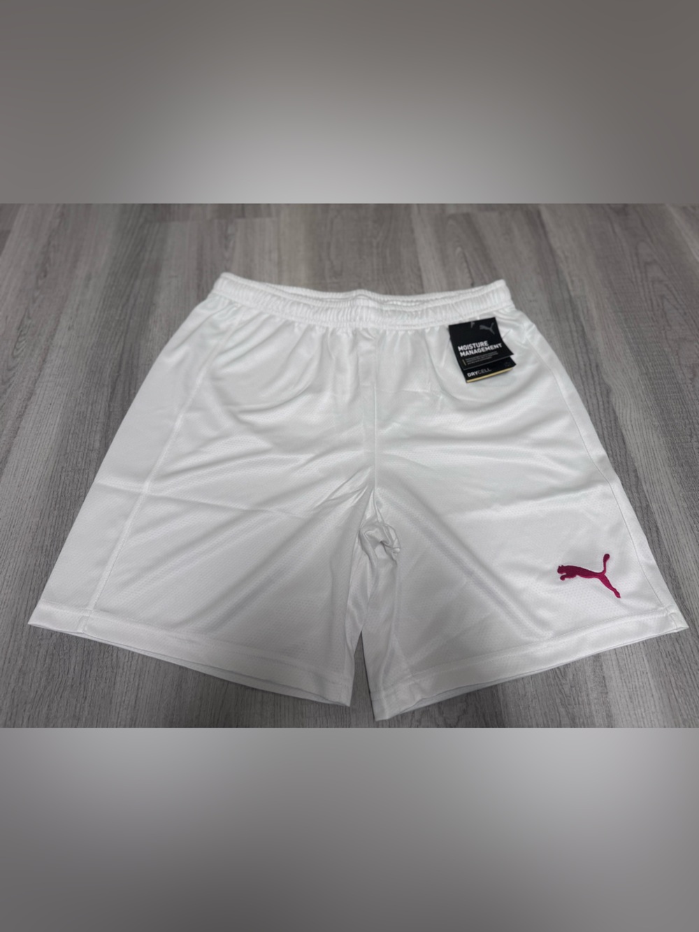Puma White Athletic Shorts with Pink Logo